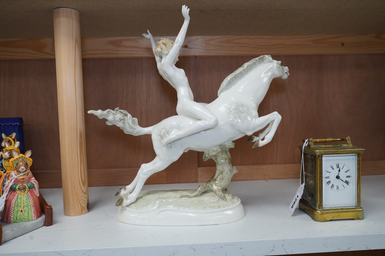 An Art Deco Hutschenreuther female nude rider on horseback, 32cm high. Condition - thumb of rider cracked